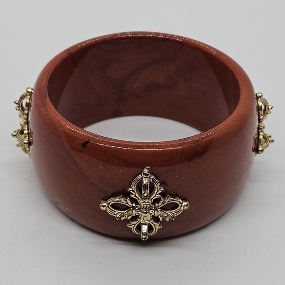 wide red-orange acrylic bangle bracelet with gold tone details - Picture 1 of 3